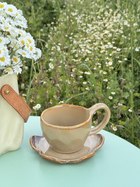 كوب بني بلمعة