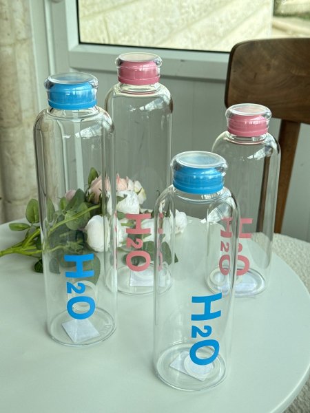 مطرة ماء زجاج